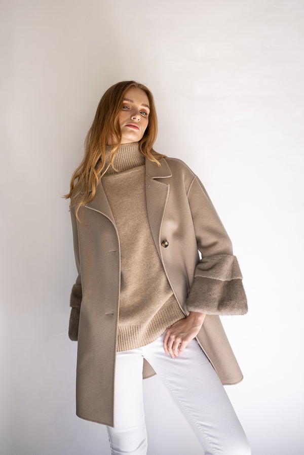 beige cashmere coat with mink fur on the sleeves