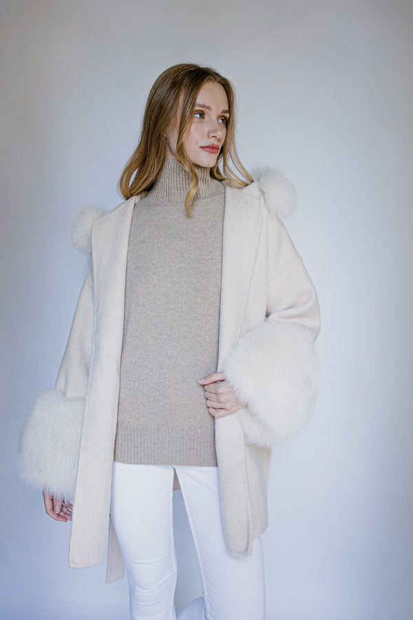 cashmere coat in cream color with detachable fox fur hood and detachable fox fur cuffs
