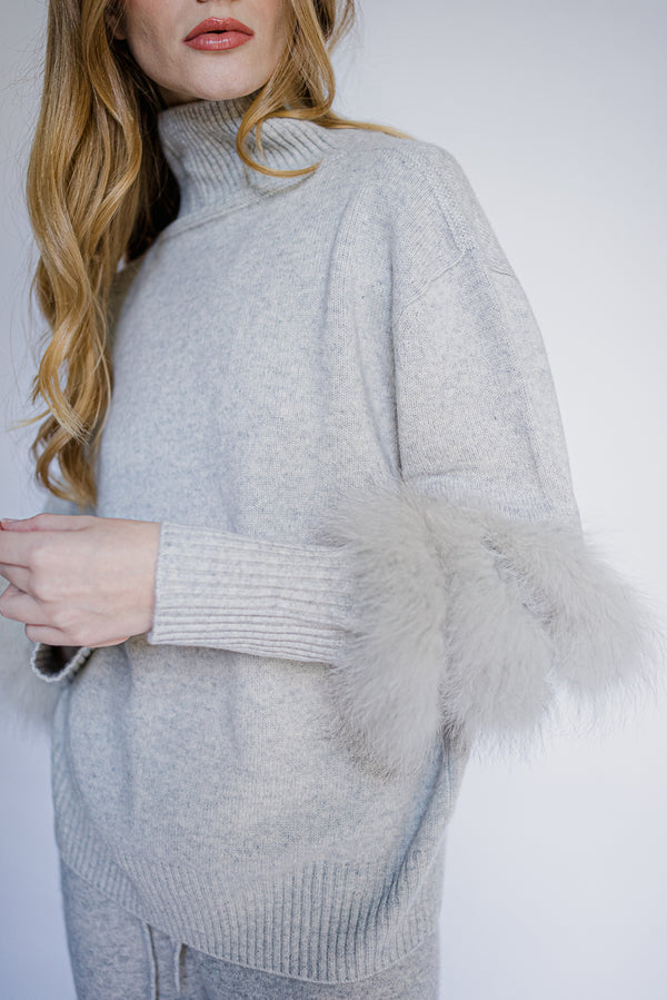grey cashmere loungewear with fur details on the sleeves