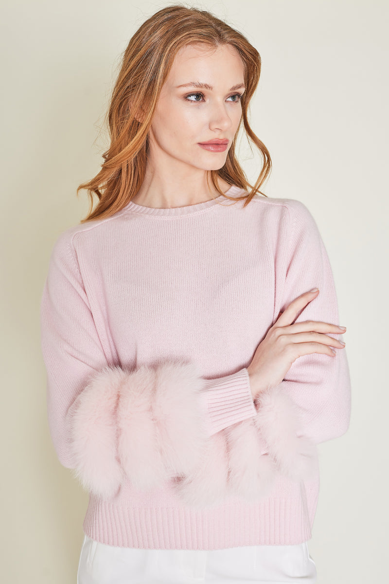 cashmere sweater with fox fur on sleeves in pink